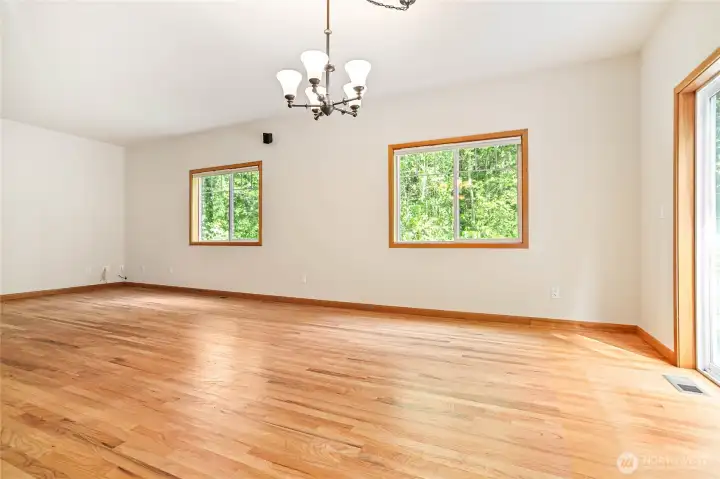 Large Living room. Slider on the right goes out to the Deck and Backyard. Large Living room. Slider on the right goes out to the Deck and Backyard.