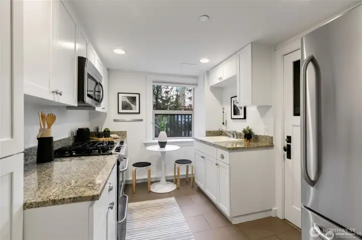 Functional kitchen with easy access to the community patio.