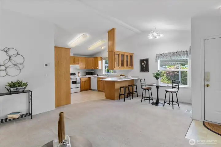 This home features an eating bar with additional space for a dedicated dining table.