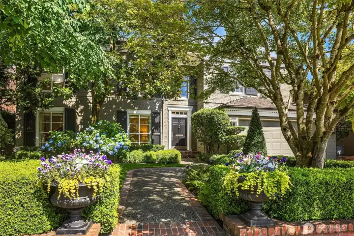 Your first impression begins here - a warm, welcoming exterior with lush landscaping and enduring curb appeal! Your first impression begins here - a warm, welcoming exterior with lush landscaping and enduring curb appeal!