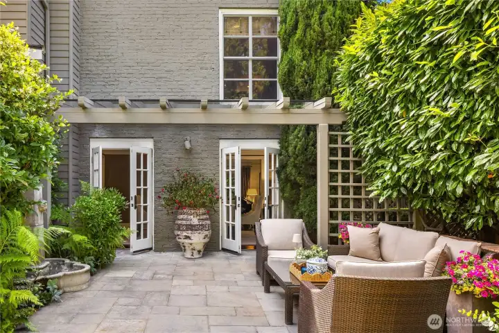 The beautifully landscaped patio provides a peaceful retreat for outdoor dining and entertaining! The beautifully landscaped patio provides a peaceful retreat for outdoor dining and entertaining!