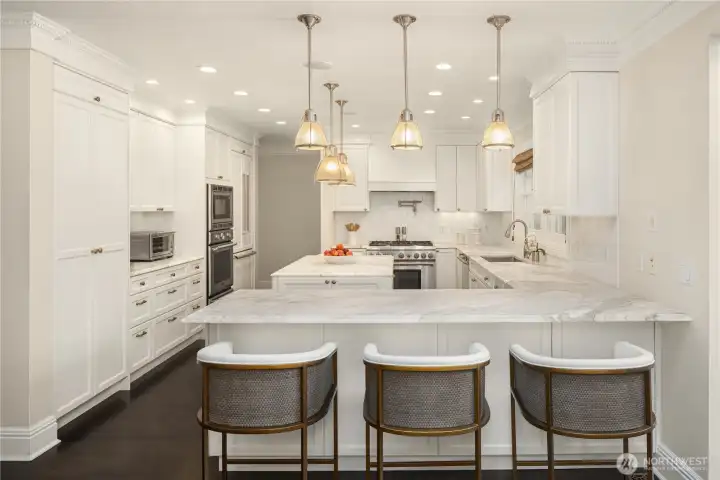 Thoughtfully designed with abundant storage, premium finishes, and seating at the island. Thoughtfully designed with abundant storage, premium finishes, and seating at the island.