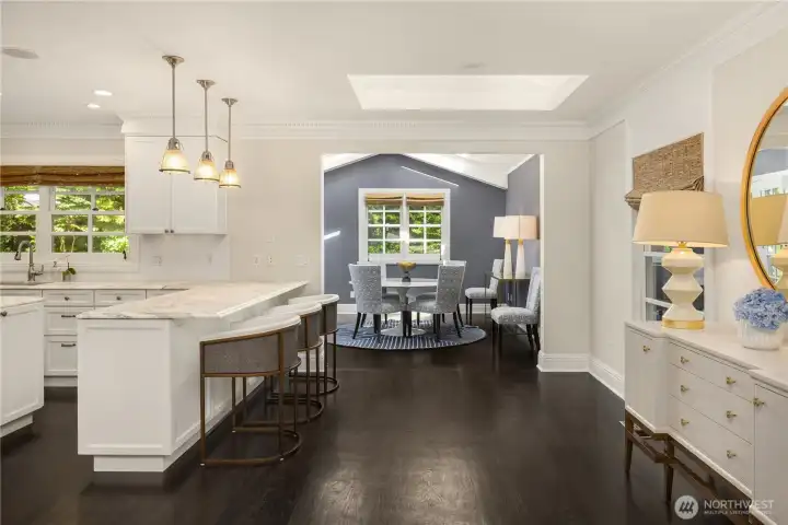 Adjacent to the kitchen, the sunlit breakfast nook creates an effortless flow for everyday dining and entertaining. Adjacent to the kitchen, the sunlit breakfast nook creates an effortless flow for everyday dining and entertaining.