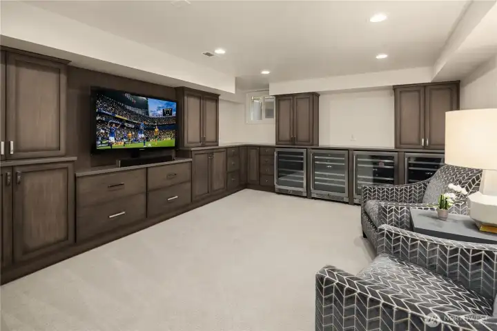 Whether hosting friends or enjoying a quiet evening in, the media and wine room pairs comfortable gathering spcae with built in wine reridgerators. Whether hosting friends or enjoying a quiet evening in, the media and wine room pairs comfortable gathering spcae with built in wine reridgerators.