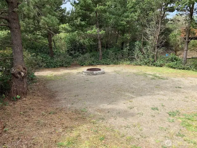 wide open lot with fire pit