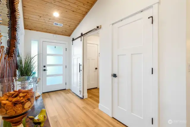 Looking back at front entry and laundry room