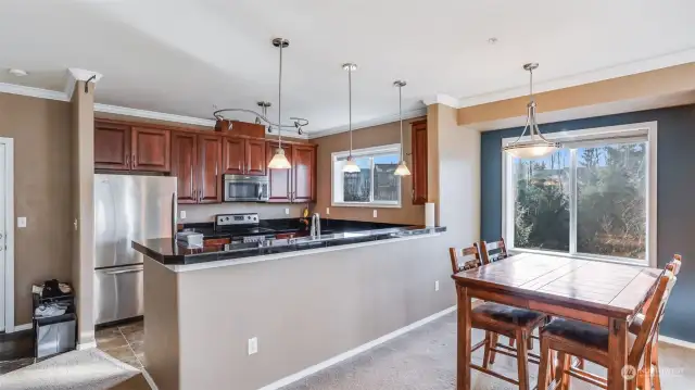 Crisp crown molding throughout along with pops of color add to the character of this home.