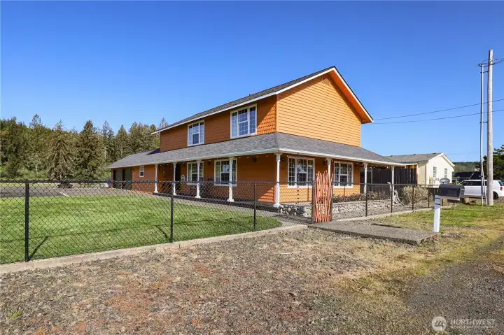 Gated entry to the home provides peace of mind.  Enjoy the view from the large wrap-around porch