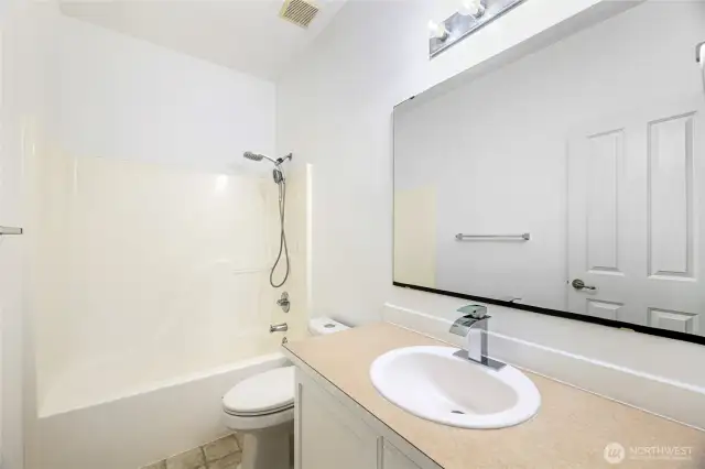 HALL BATH  Single vanity  Tub/Shower with new shower head  New faucet  Freshly painted cabinets