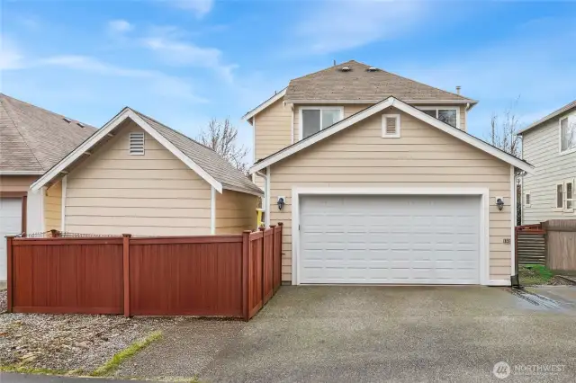 2 CAR ATTACHED GARAGE  EV Charging Station  Extra room for shop or office or storage  Attic Storage / Garage door opener
