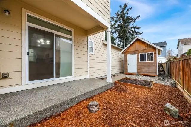 Covered aggregate patio   10’ X 15’ Shed  Planter Box / Faucet in rear yard  RV parking on back side of the house
