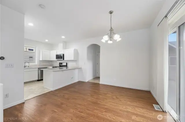 Dining area with slider to rear side door