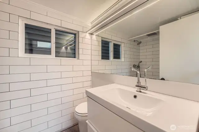 Lovely 3/4 bathroom with large shower.