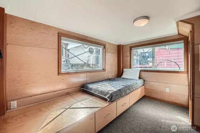 This is a flex space with so many opportunities, tons of storage with each section that lifts up or pull open the drawers. Additionally pull outs can create a king size sleeping space or sixe down to a twin, potientially with a twin on each end. You choose...