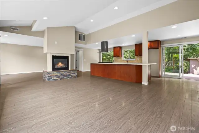 Great Room With vaulted ceilings large breakfast  bar and gas fireplace