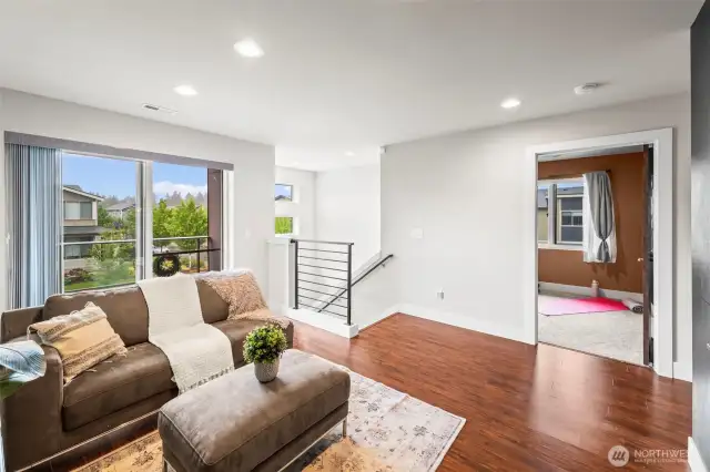 On the top of the stairs, spacious bonus room!