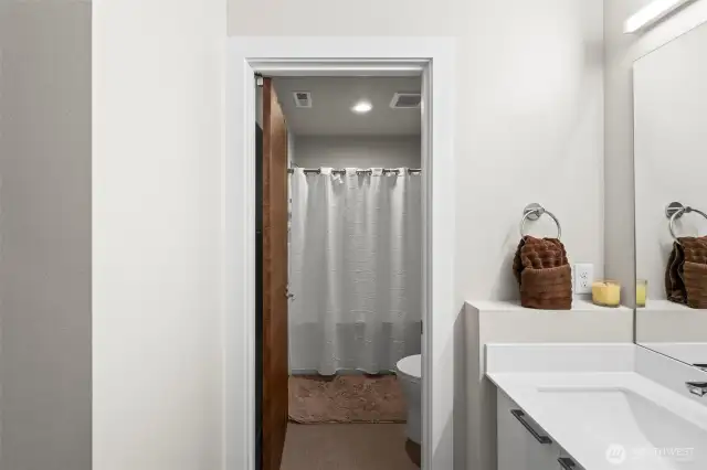 Upstairs full bath has separate water-closet/shower area.