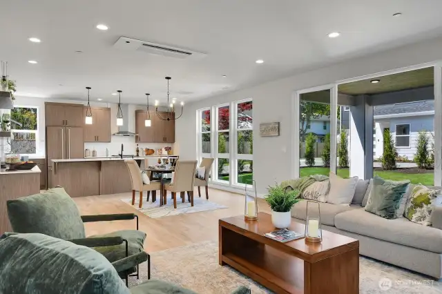 The great room, dining room, and kitchen combine seamlessly for easy entertaining.