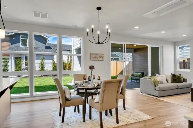 High ceilings and floor to ceiling windows create a light-filled sanctuary, perfect for both entertaining and everyday living.