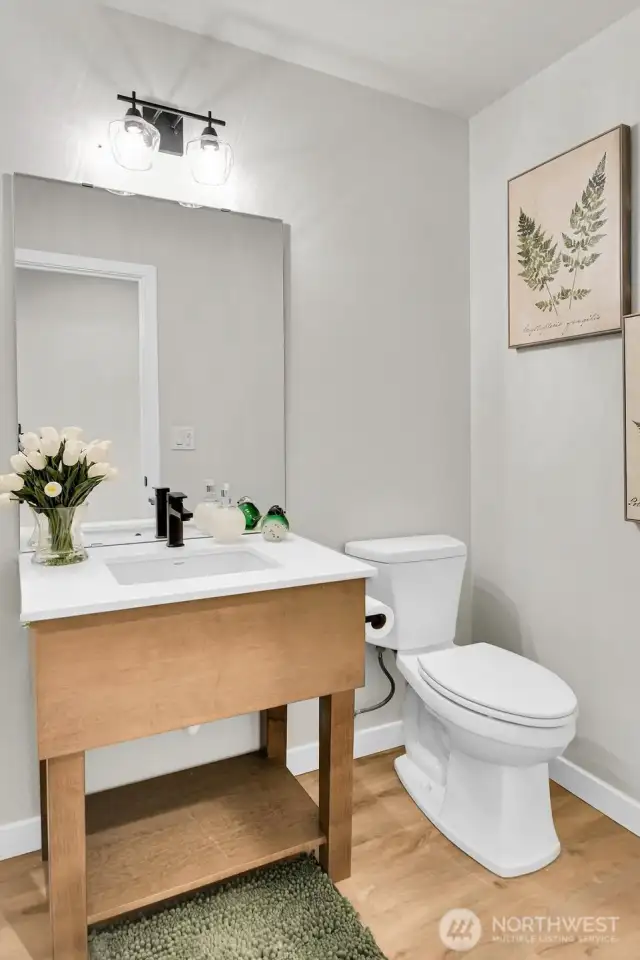 Main floor powder room (easily add a shower for a 3/4 bath)!