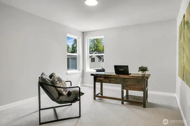 One of three large secondary bedrooms.