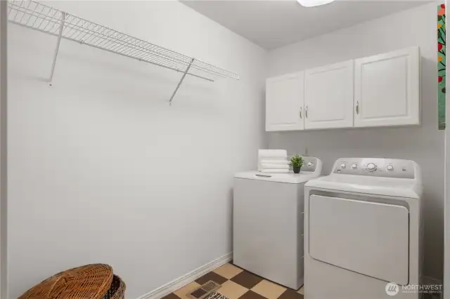 Large laundry room off garage entrance, plumbed for utility sink or dog washing station!?