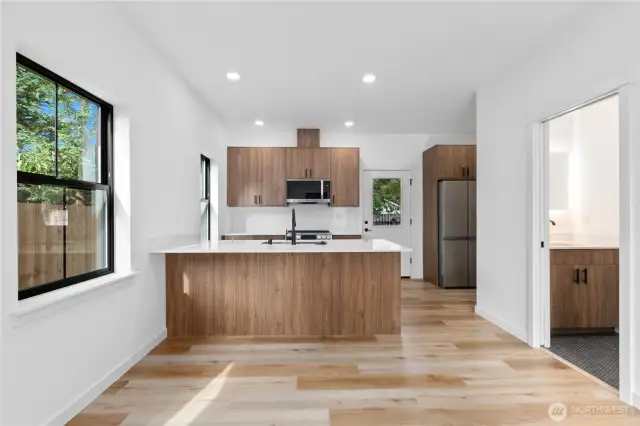 Walnut cabinets & island in kitchen