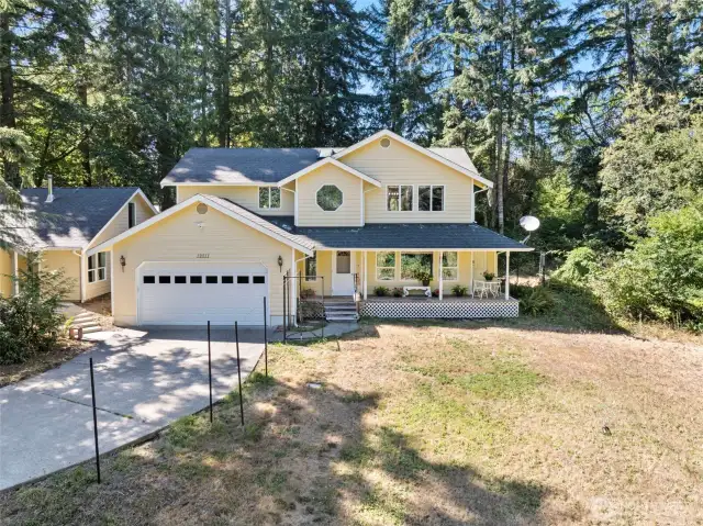 The home has something for everyone! Privacy, over an acre, 2700 sq ft, shop/studio and more.