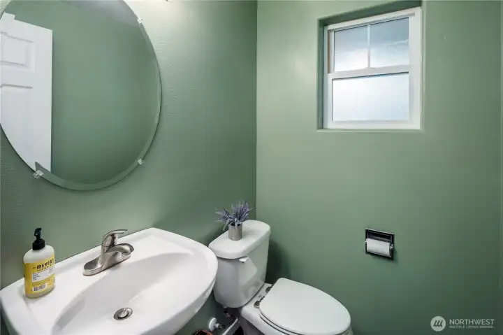 !/2 bath downstairs with fresh paint, flooring and trim.
