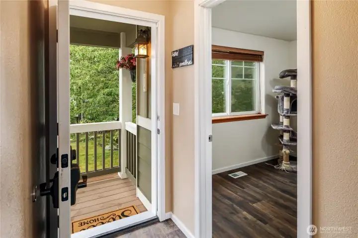 Entry view and showing den, office or 4th bedroom on main level.