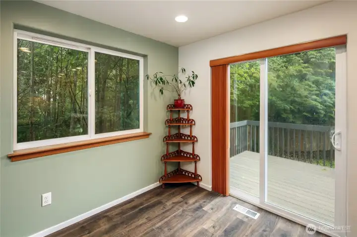 Formal dining area with new paint, trim and flooring.