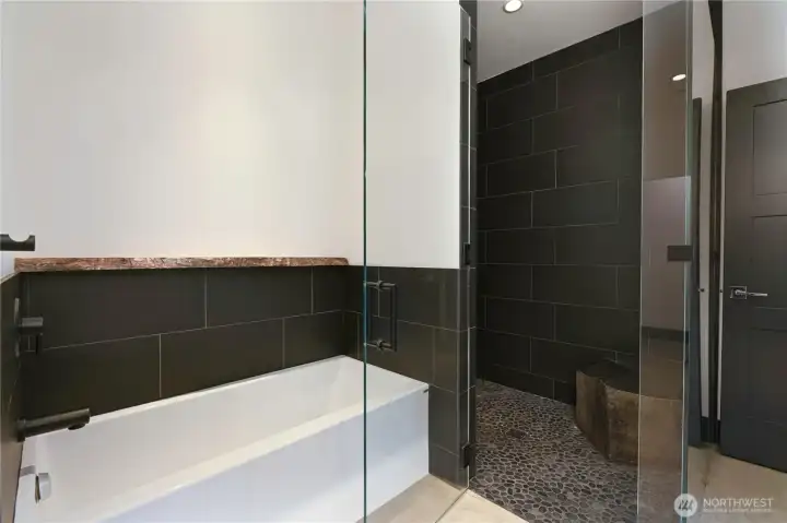 Custom designed and installed basalt shower  -  bench created by  renowned Seattle artist John Hoge.