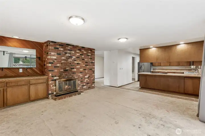 View from family room to kitchen and hallway, love the butler's pantry on the left.