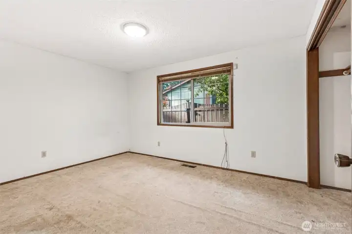 Primary bedroom, ample in size.