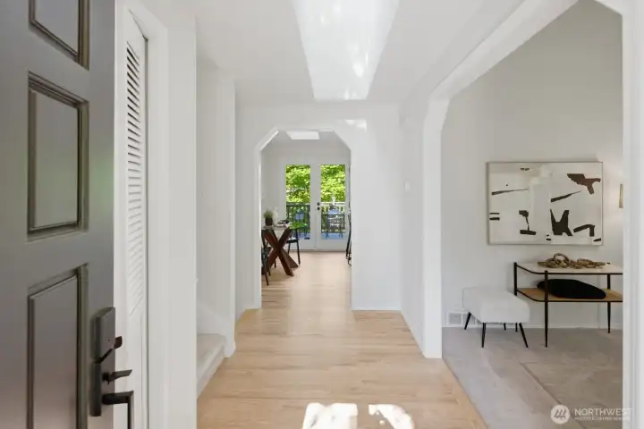 Step inside to soaring ceilings, incredible natural light, and beautiful hardwood floors showcasing all this stunning home offers.