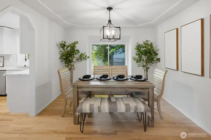 Formal dining room with full bay window overlooking your park-like backyard