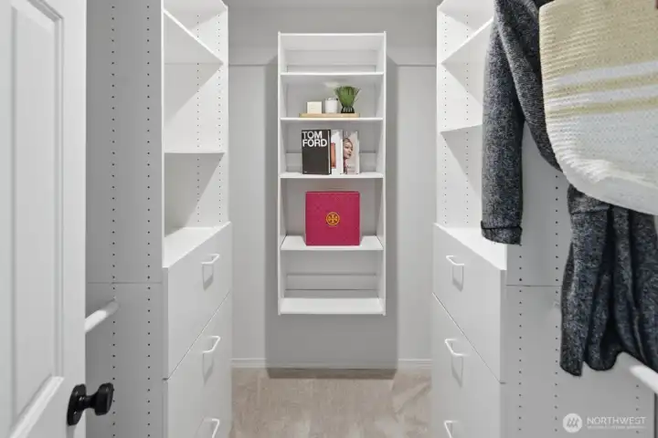 Primary suite walk-in-closet with organizers