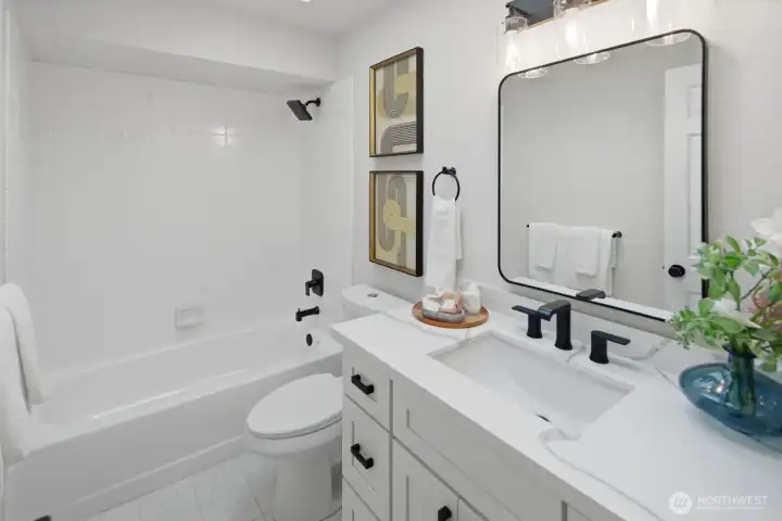 Updated full Guest Bathroom on upper level.