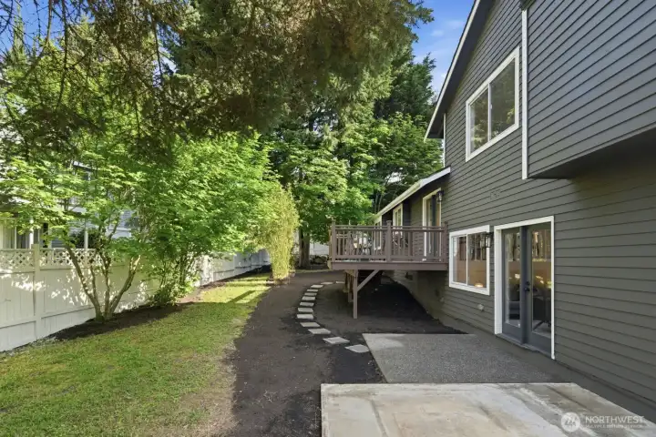 Park-like backyard showcasing the beauty of this beautifully designed and updated home