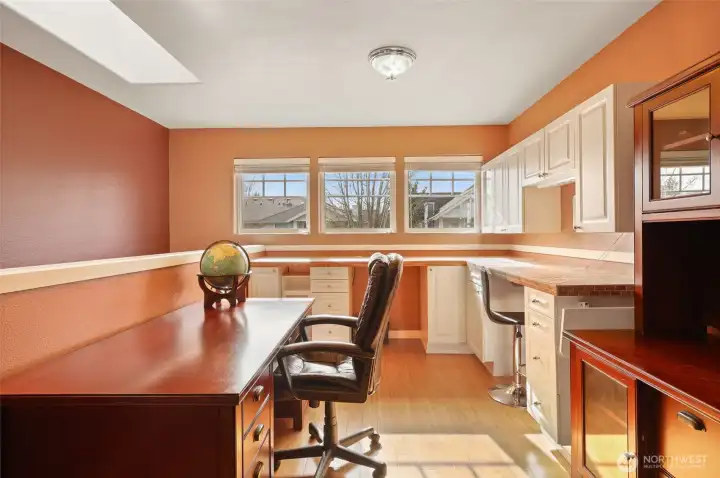 Fold up additional space off right-side countertop! And, three lovely picture windows for added light!