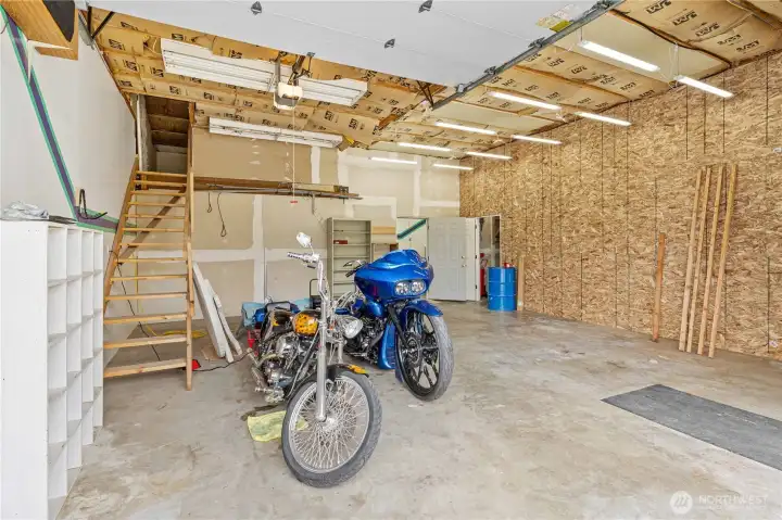 Garage with office/storage area at the top