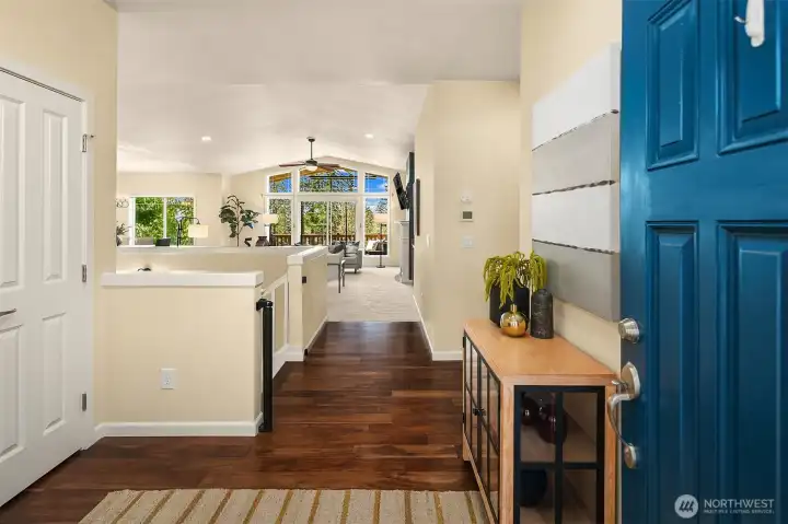 Entry leading you into grand open living space.