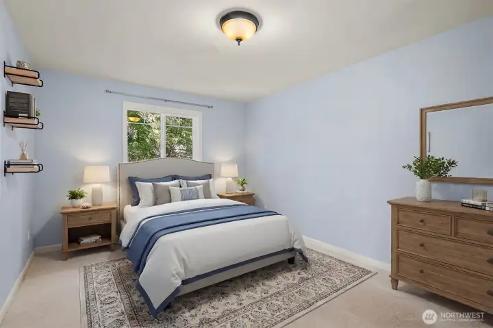 Virtually staged. 2nd of 3 lower level rooms.