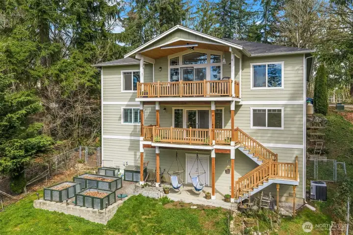 View of the back of the home. Get ready to enjoy 2 view decks and garden!