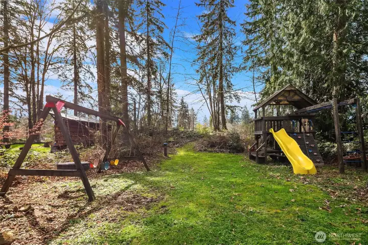 Large yard ideal for outdoor living in a park-like setting