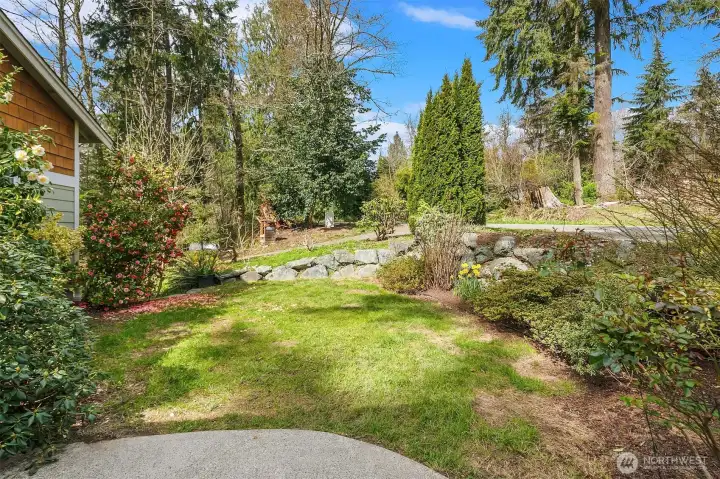 Mature landscaping in the front of home was well!