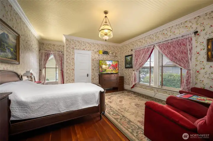 Second bedroom upstairs. Spacious and filled with natural light. Overlooks backyard gardens...