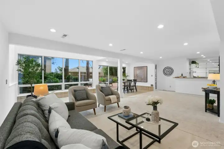 Spacious family room with gas fireplace & wet bar
