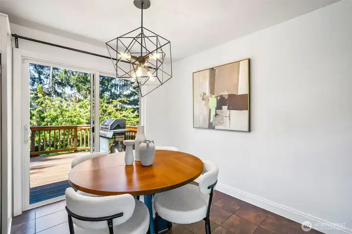 Dining area with slider out to the deck.