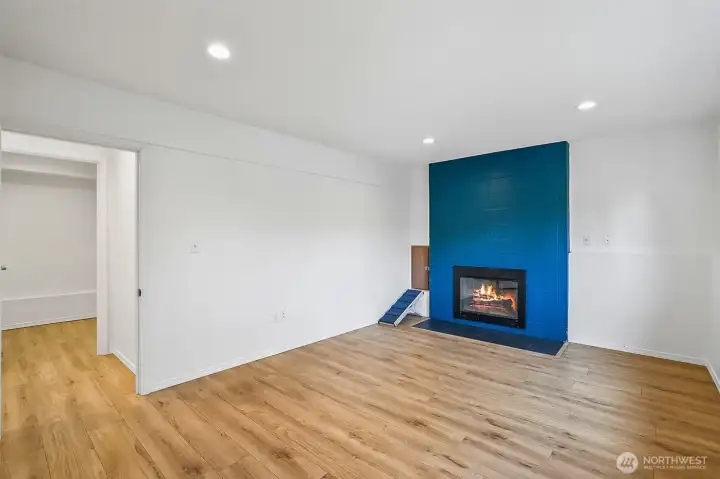 Another view of the "TV/game" room shows the built-in dog door.  This opens to a dedicated fenced area at the side of the home.